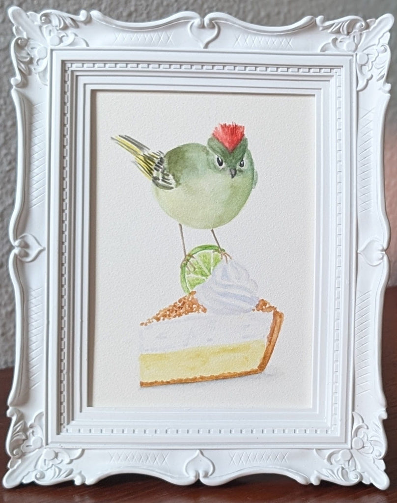Volta Voloshin-Smith, Ruby Crowned Kinglet on a Key Lime Pie - Original Painting