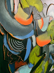 Colorful abstract pattern of cut-out shapes on a dark background