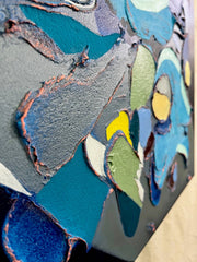 Abstract art piece with colorful, textured shapes on a gray background