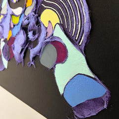 Abstract art piece with colorful shapes on a black background