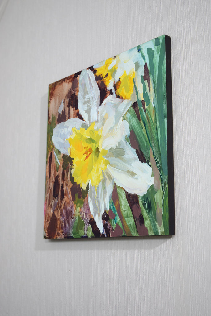 Canvas oil painting of daffodils on a wall