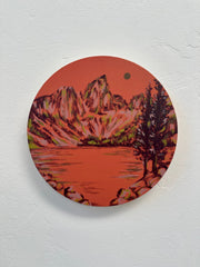 Round contemporary art painting with a mountain and lake scene