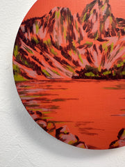 Circular painting of a mountain landscape with a lake, emerging artist