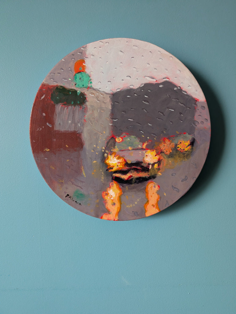 Circular artwork with abstract design on a blue background