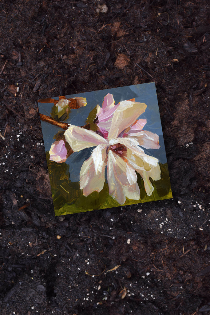 Painting of a flower on a dark textured surface