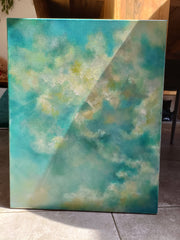 Abstract painting with teal, green, and yellow colors on a textured surface.