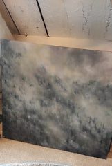 Textured black and gray abstract painting original wall art on a wooden surface