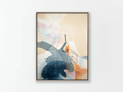 Framed abstract artwork with watercolor textures on a white wall