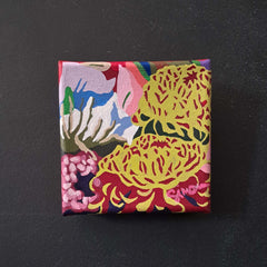Colorful floral square painting on canvas on a black background