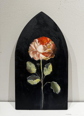 Painting of a flower against a black background on a shaped wooden panel.