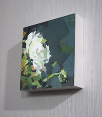 Abstract painting of a flower on a textured wall