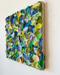 Colorful abstract wall art piece shown in context on a wall by Shiri Phillips