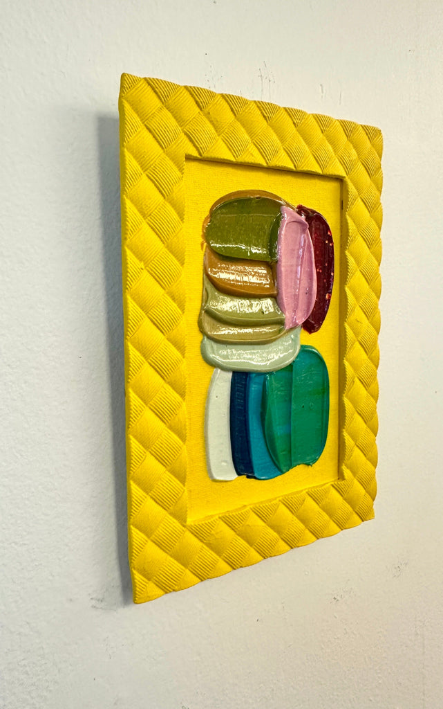 Colorful abstract contemporary artwork in a yellow frame by artist Shiri Phillips