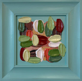 Framed artwork of colorful abstract design on a teal background