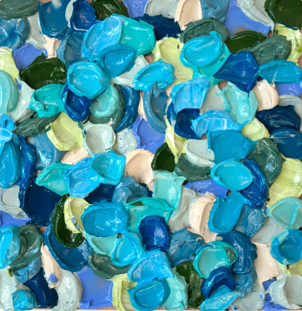Colorful acrylic abstract painting in blue, green, and beige on board. 