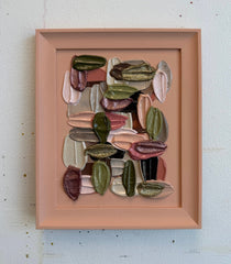 Framed artwork with colorful abstract design 