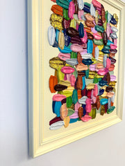 Colorful abstract art piece in a frame by emerging artist Shiri Phillips