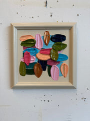Framed artwork with colorful abstract design