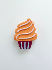 Cupcake wall art sculpture in tones of orange and burgundy