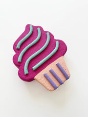 Colorful cupcake-shaped wall artwork contemporary sculpture on a white background