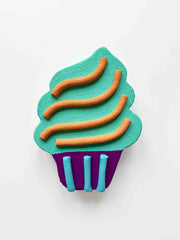 wall sculpture artwork cupcake in tones of green, purple, orange, and teal