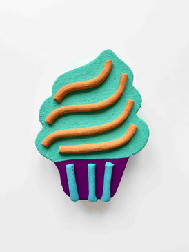 wall sculpture artwork cupcake in tones of green, purple, orange, and teal